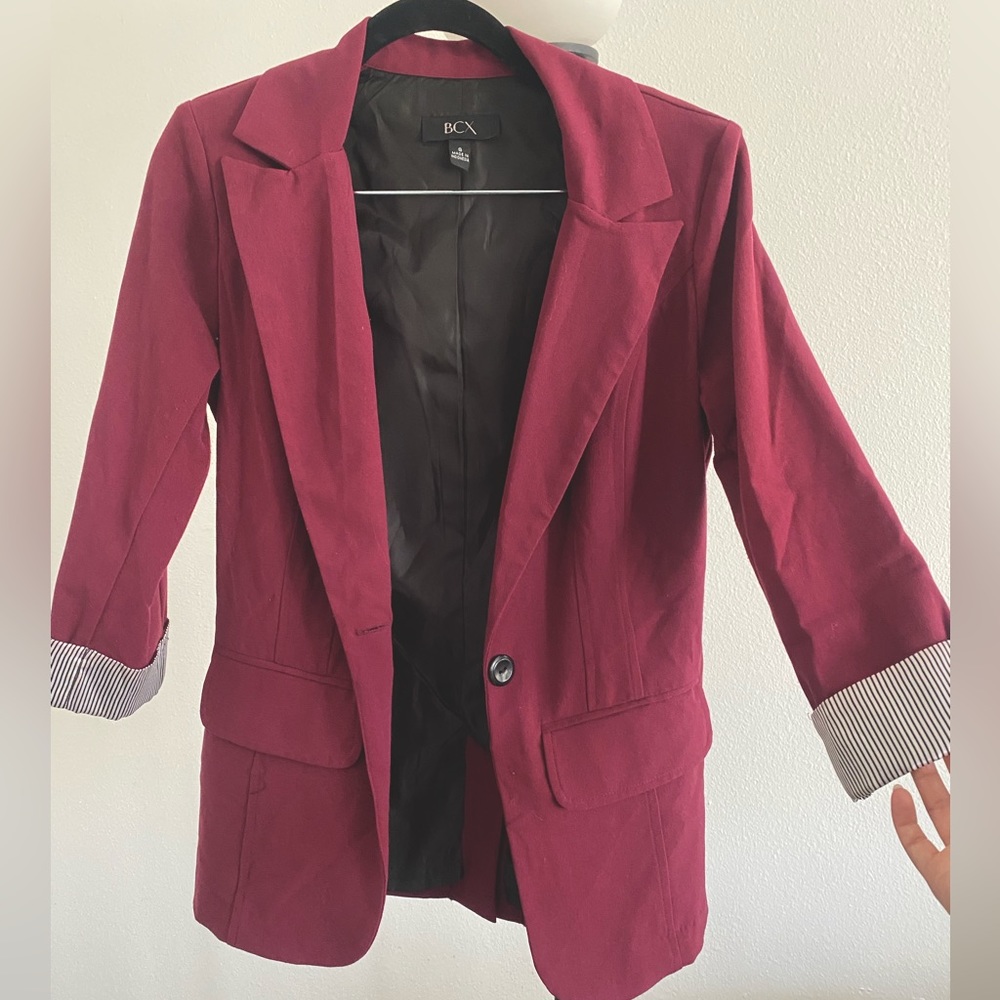 Maroon blazer with pin stripes on cuffs